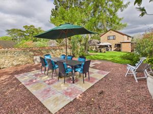 Rear paved seating area- click for photo gallery